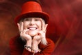 Smiling woman. Beautifu youngl woman wearing red hat and in a red sweatshirt. Young woman with beautiful smile happy and excited Royalty Free Stock Photo