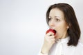 Smiling woman bite red apple Royalty Free Stock Photo