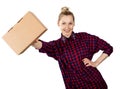 Smiling woman with blank cardboard box in hand on white background Royalty Free Stock Photo