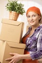 Smiling woman with boxes Royalty Free Stock Photo