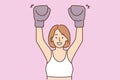 Smiling woman in boxing gloves training