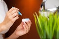 Smiling woman with contact eye lenses and container in hand Royalty Free Stock Photo