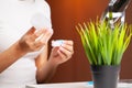 Smiling woman with contact eye lenses and container in hand Royalty Free Stock Photo