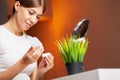 Smiling woman with contact eye lenses and container in hand Royalty Free Stock Photo