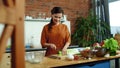 Woman cutting vegetables for salad in kitchen. Housewife cooking healthy meal. Royalty Free Stock Photo