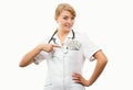 Smiling woman doctor with stethoscope showing currencies dollar in apron pocket, corruption or bribe concept Royalty Free Stock Photo