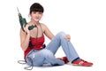 Smiling woman with a drill