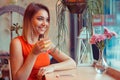 Smiling woman drinking orange juice, looking away Royalty Free Stock Photo