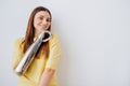 Smiling woman with elegant bionic prosthesis arm on grey Royalty Free Stock Photo