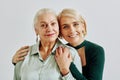 Smiling Woman Embracing Mother Royalty Free Stock Photo