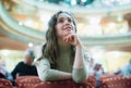 Smiling woman enjoying theatre performance Royalty Free Stock Photo