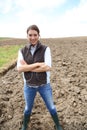 Smiling woman farmer in the fields Royalty Free Stock Photo