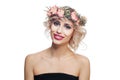 Smiling woman in flowers crown. Young model with short blonde curly hair and makeup isolated on white background Royalty Free Stock Photo