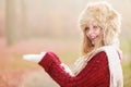 Smiling woman in fur winter hat with copyspace. Royalty Free Stock Photo