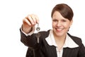 Smiling woman gives over house key Royalty Free Stock Photo