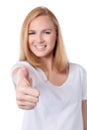 Smiling woman giving a thumbs up gesture Royalty Free Stock Photo