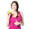 Smiling woman with green apple Royalty Free Stock Photo