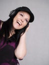 Smiling woman with headphones listening music Royalty Free Stock Photo