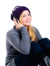 Smiling woman with headphones listening music Royalty Free Stock Photo