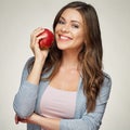 Smiling woman with healthy teeth holdinh red apple.