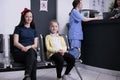 Smiling woman and her child attending pediatrician appointment in private clinic Royalty Free Stock Photo