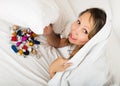Smiling woman hiding with sweet candy Royalty Free Stock Photo