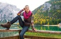 Smiling woman hiker posing at Lake Bries with autumn colours Royalty Free Stock Photo