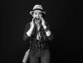 Smiling woman hiker shouting through megaphone shaped hands Royalty Free Stock Photo