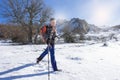 Smiling woman hiker on snowy mountain Royalty Free Stock Photo