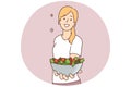 Smiling woman hold bowl of vegetarian salad