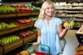 Smiling woman holding apples Royalty Free Stock Photo