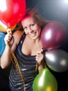 Smiling woman holding ballons Royalty Free Stock Photo