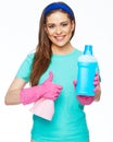 Smiling woman holding bottle of chemistry for cleaning house sh Royalty Free Stock Photo