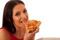 Smiling woman holding delicious pizza in carton box.