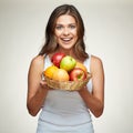 Smiling woman holding fruit set. red, green apples. oranges. Royalty Free Stock Photo