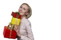 Smiling woman holding gift boxes on white background. Royalty Free Stock Photo