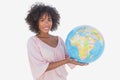 Smiling woman holding globe Royalty Free Stock Photo