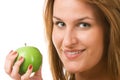 Smiling woman holding green apple. Royalty Free Stock Photo