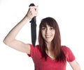 Smiling Woman Holding Knife Looking at Camera