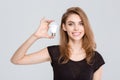 Smiling woman holding light bulb Royalty Free Stock Photo