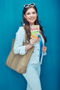 Smiling woman holding passport and credit card ready for vacation travel Royalty Free Stock Photo