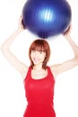 Smiling Woman Holding Pilates Ball