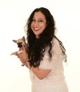 Smiling woman holding small dog Royalty Free Stock Photo