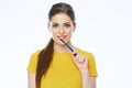 Smiling woman holding toothy brush. Isolated studio portrait. Royalty Free Stock Photo