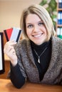 Smiling woman holding two credit cards Royalty Free Stock Photo