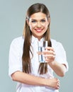 Smiling woman holding water glass. Isolated portrait of young m Royalty Free Stock Photo