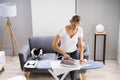 Smiling Woman Ironing Clothes Using Iron Board After Laundry Royalty Free Stock Photo