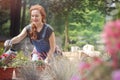 Smiling woman in jean dungarees Royalty Free Stock Photo