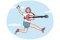 Smiling woman jump playing on guitar