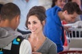 Smiling Woman In Laundromat